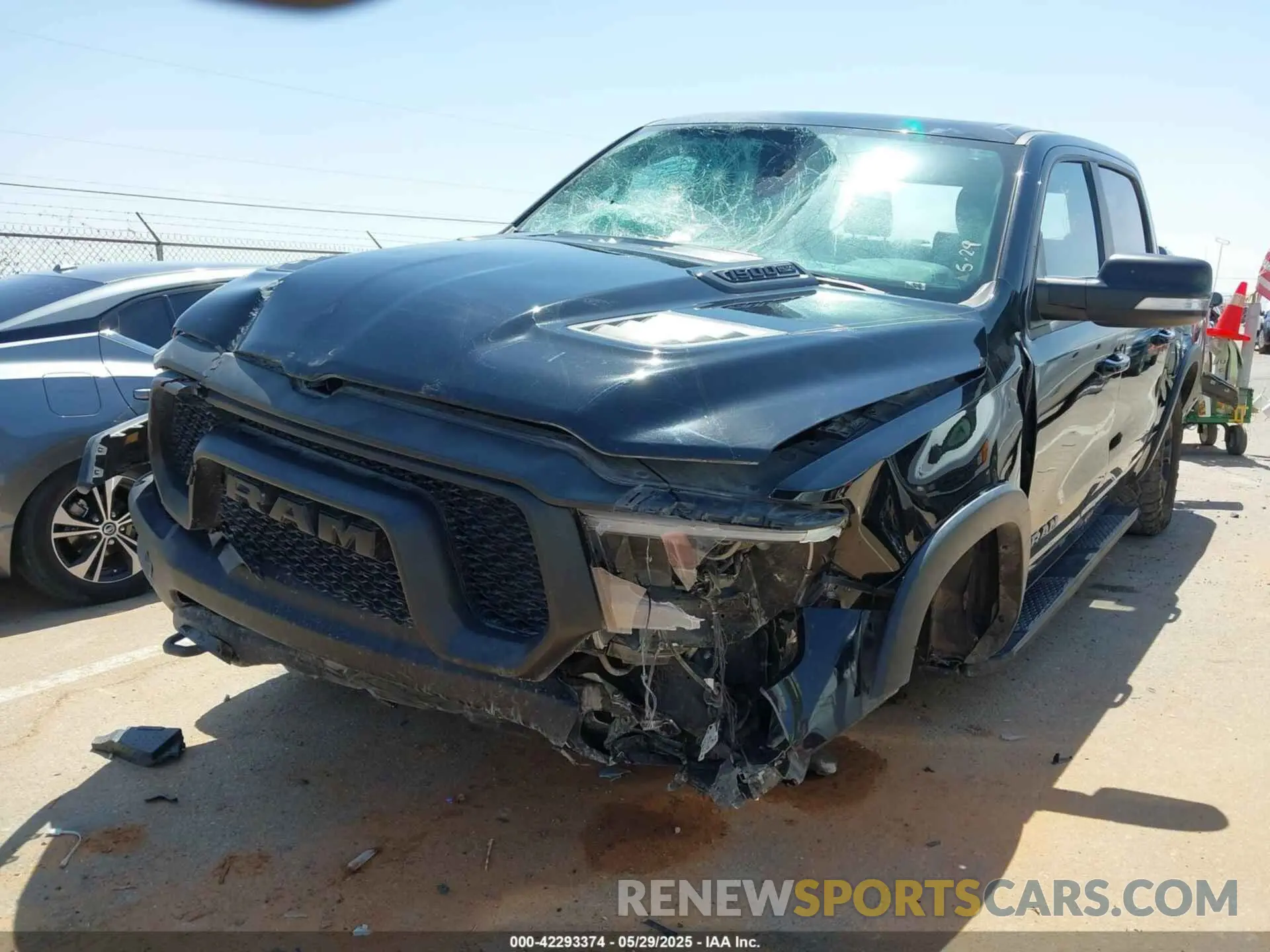 6 Photograph of a damaged car 1C6SRFLT8LN377312 RAM 1500 2020
