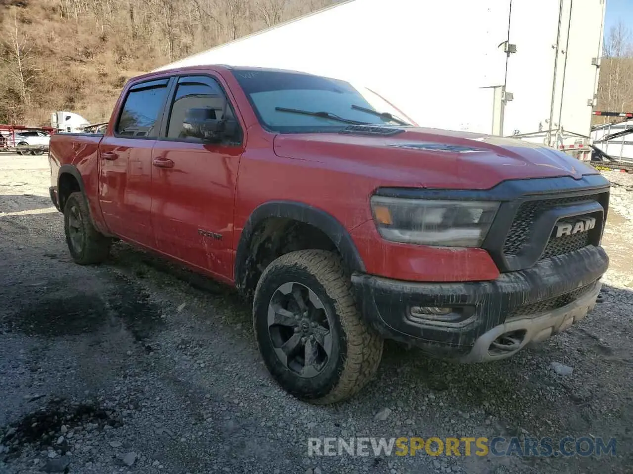4 Photograph of a damaged car 1C6SRFLT8LN422071 RAM 1500 2020