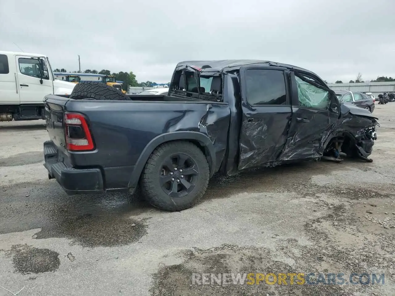 3 Photograph of a damaged car 1C6SRFLT9LN243523 RAM 1500 2020