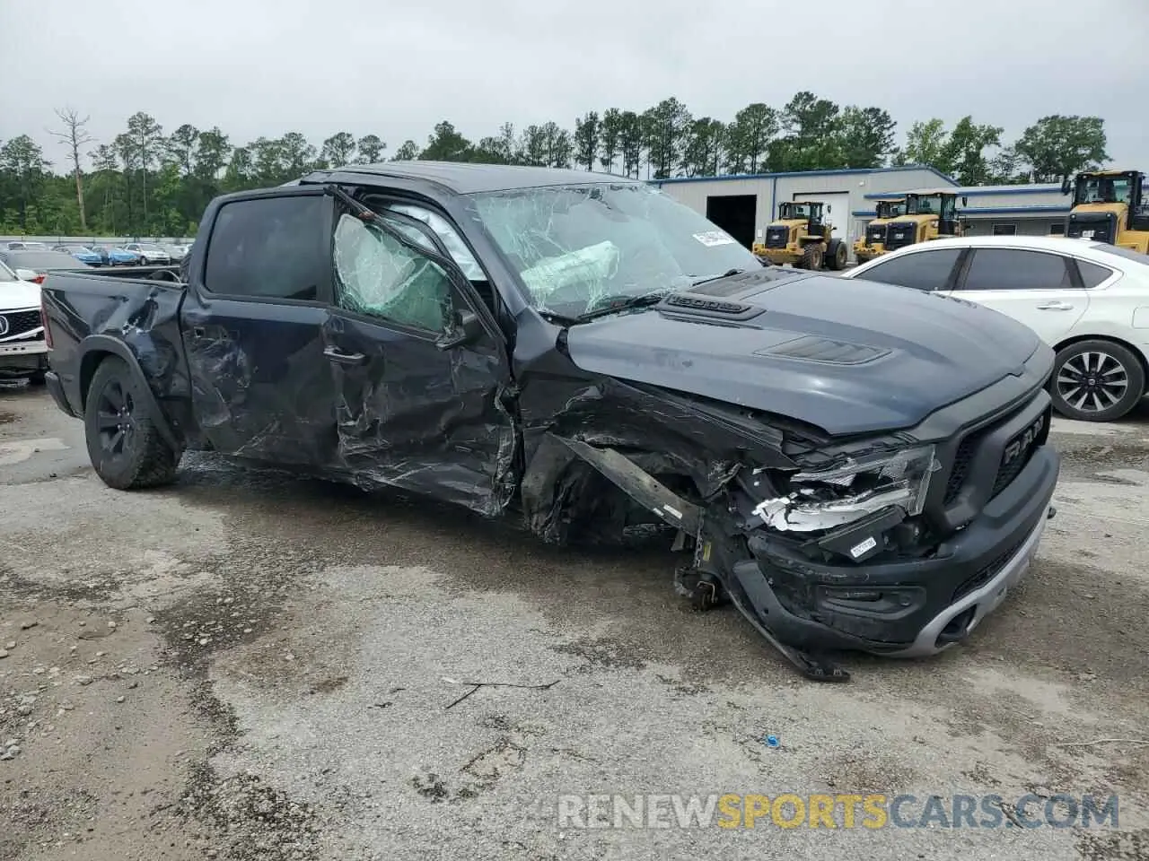 4 Photograph of a damaged car 1C6SRFLT9LN243523 RAM 1500 2020