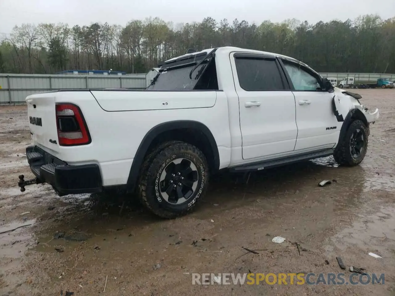 3 Photograph of a damaged car 1C6SRFLT9LN356100 RAM 1500 2020