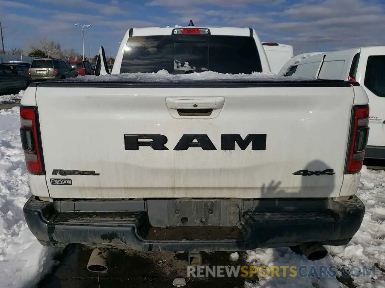 6 Photograph of a damaged car 1C6SRFLT9LN380428 RAM 1500 2020