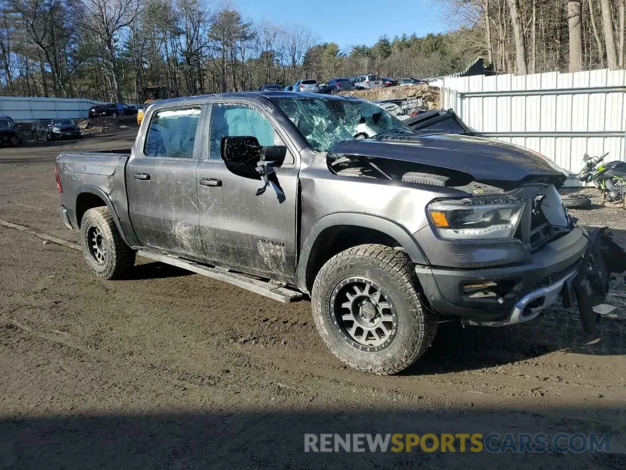 4 Photograph of a damaged car 1C6SRFLTXLN143365 RAM 1500 2020