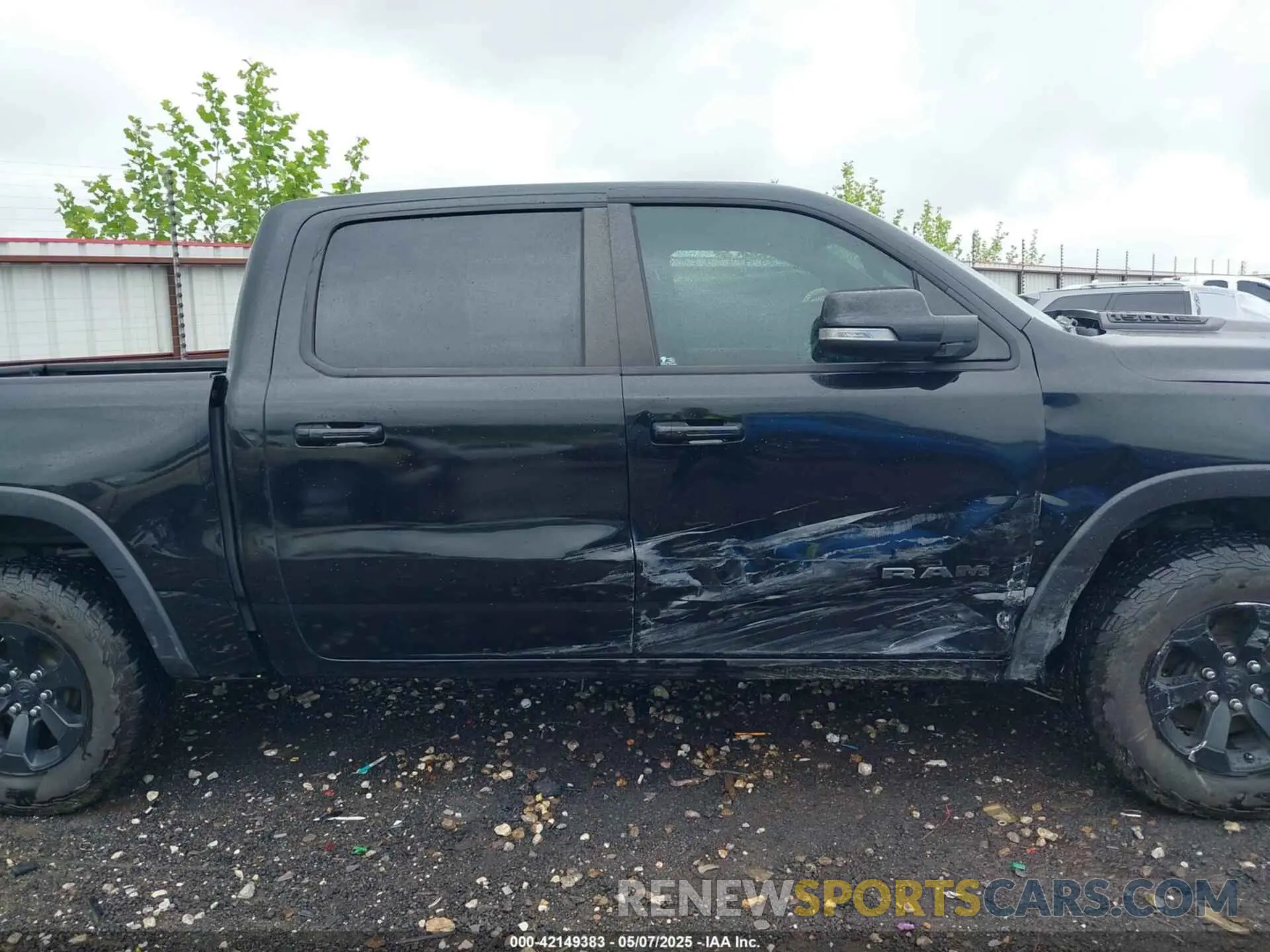 13 Photograph of a damaged car 1C6SRFLTXLN299096 RAM 1500 2020
