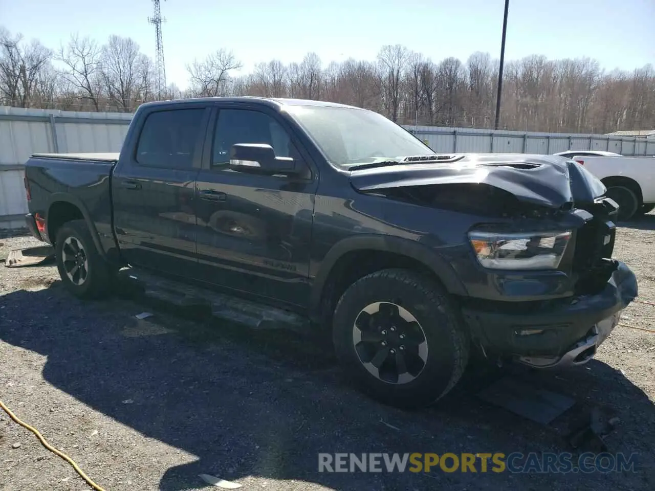 4 Photograph of a damaged car 1C6SRFLTXLN342707 RAM 1500 2020