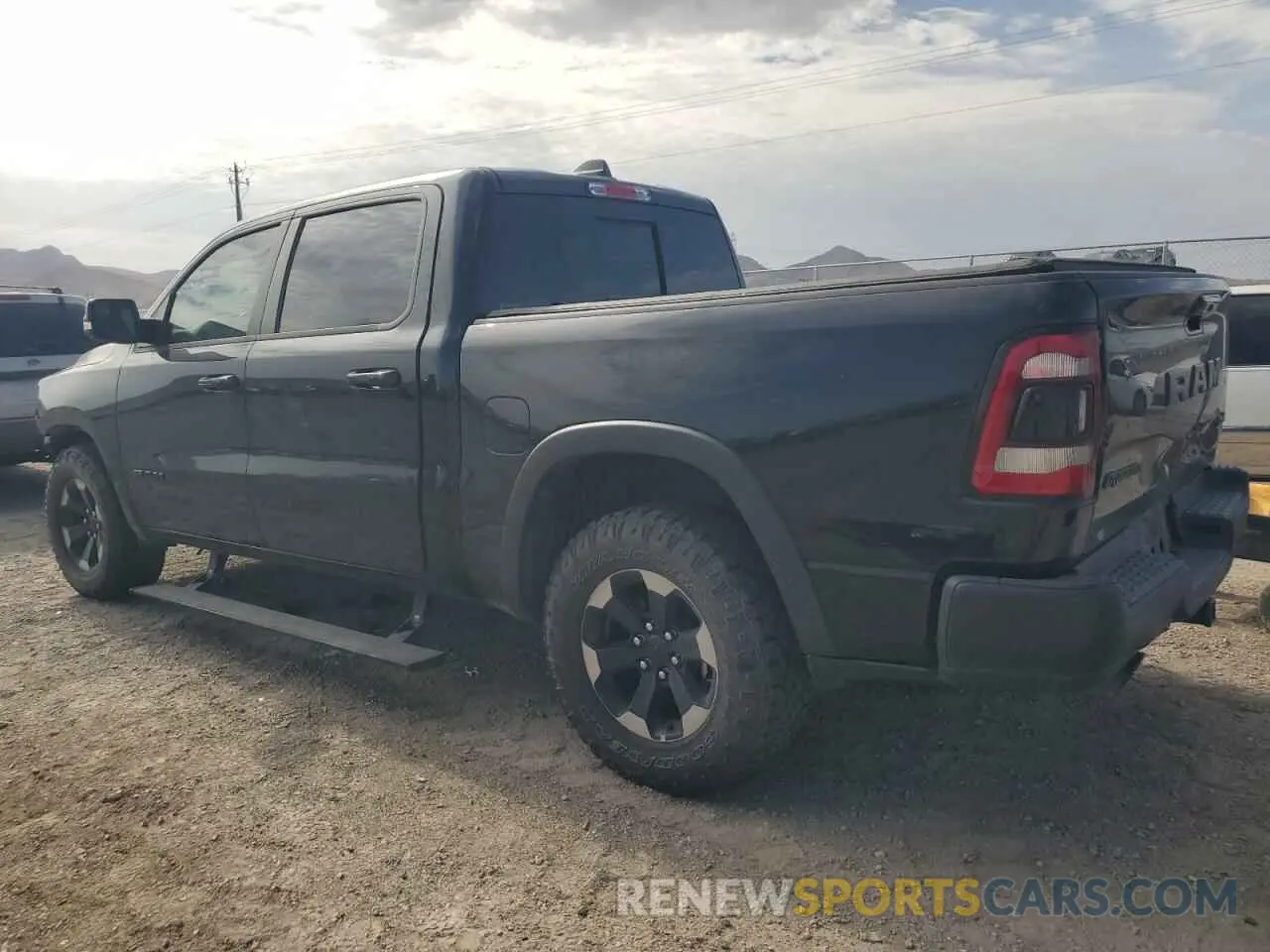2 Photograph of a damaged car 1C6SRFLTXLN393172 RAM 1500 2020