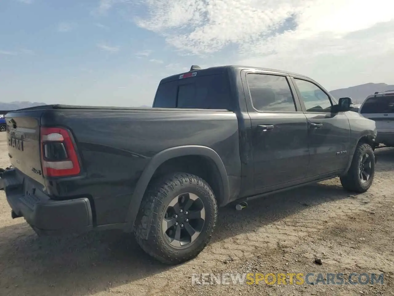 3 Photograph of a damaged car 1C6SRFLTXLN393172 RAM 1500 2020
