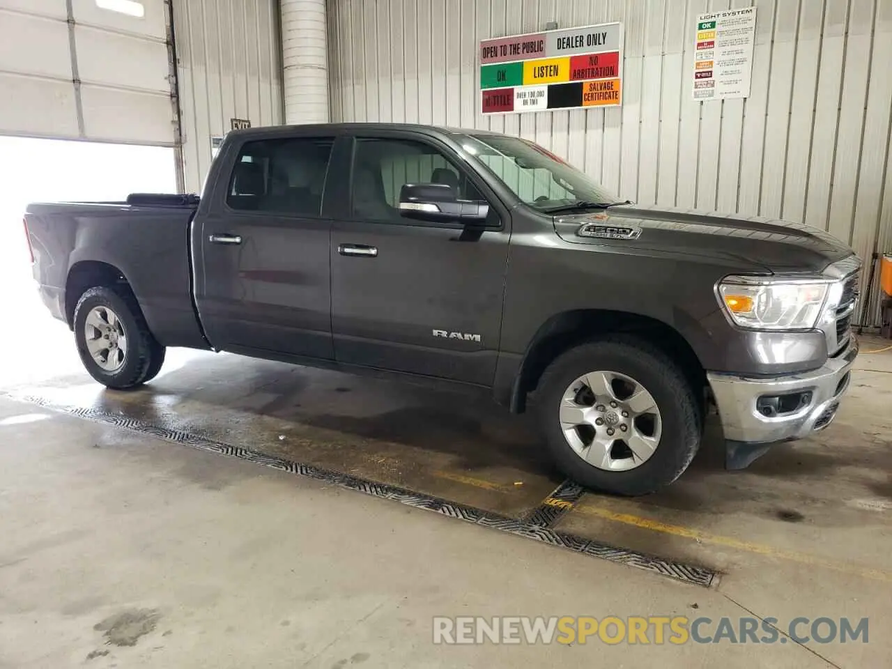 4 Photograph of a damaged car 1C6SRFMT0LN402167 RAM 1500 2020