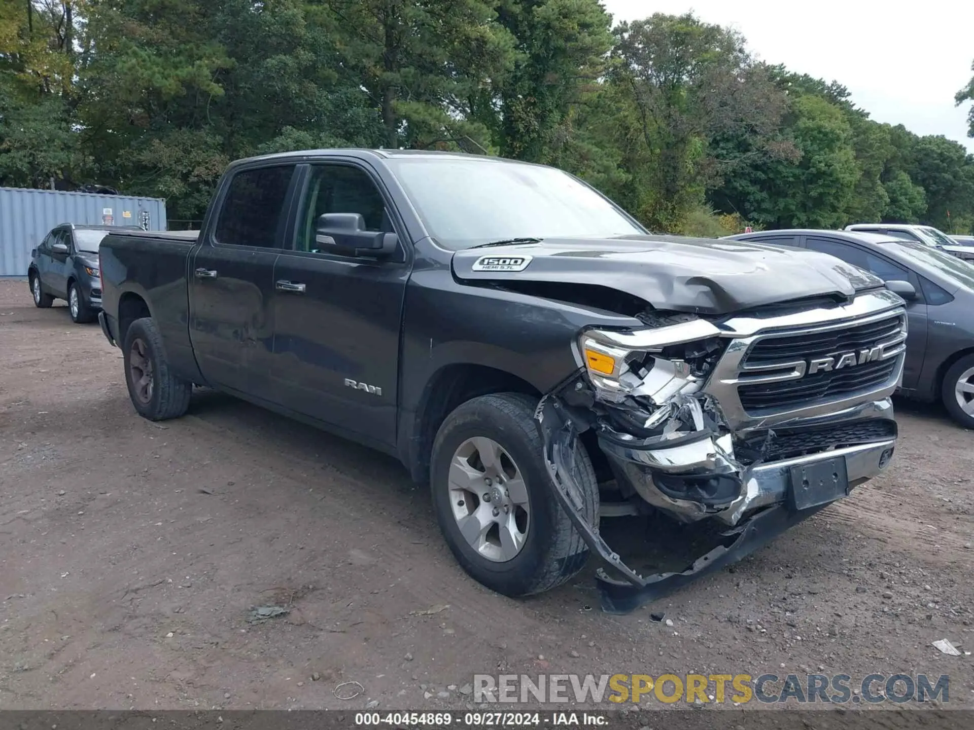 1 Photograph of a damaged car 1C6SRFMT3LN143125 RAM 1500 2020