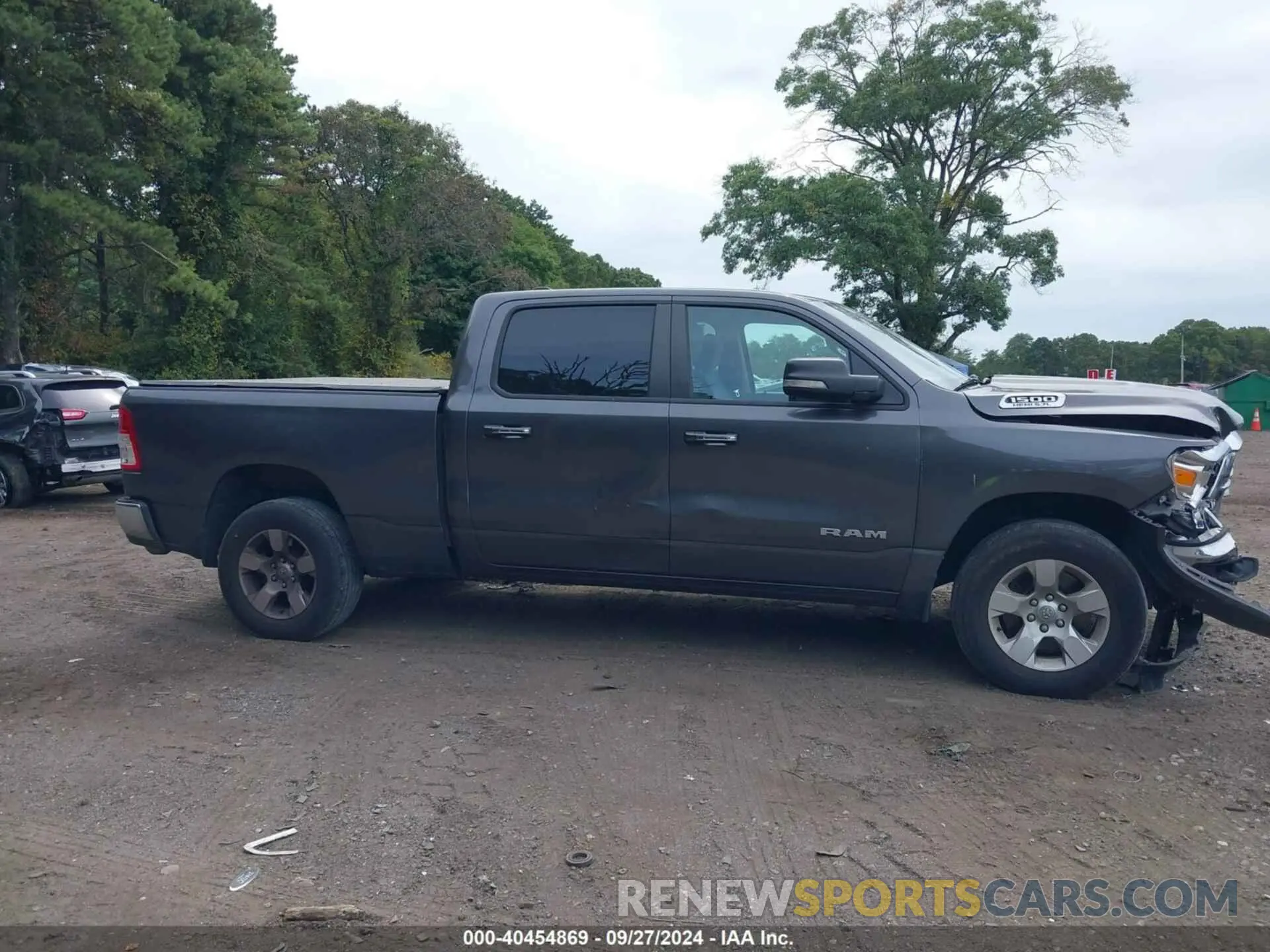 13 Photograph of a damaged car 1C6SRFMT3LN143125 RAM 1500 2020