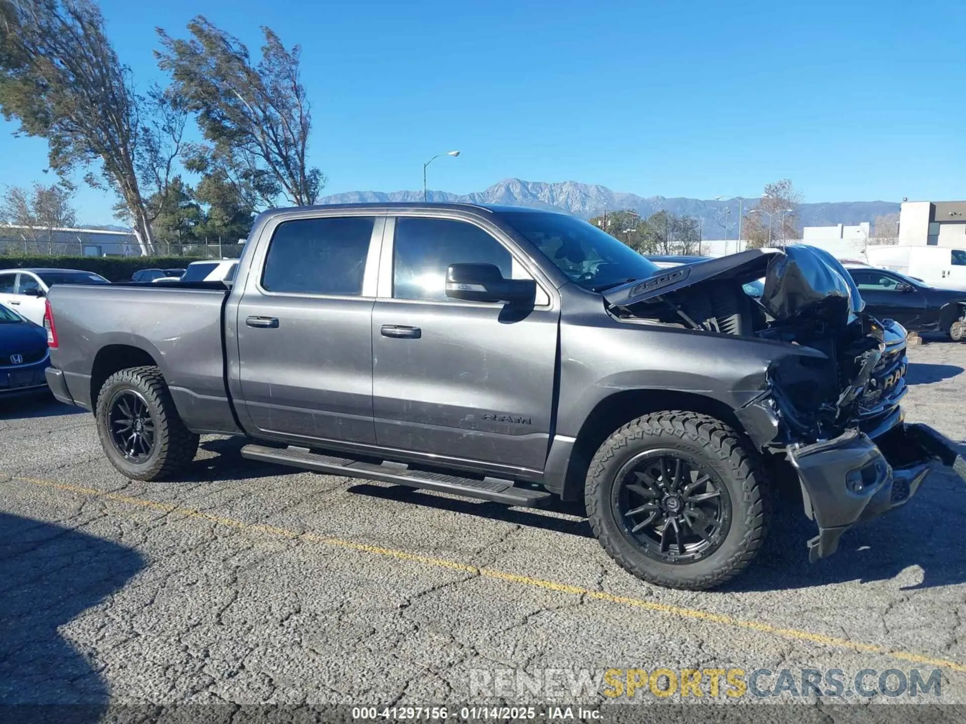 13 Photograph of a damaged car 1C6SRFMT6LN118624 RAM 1500 2020