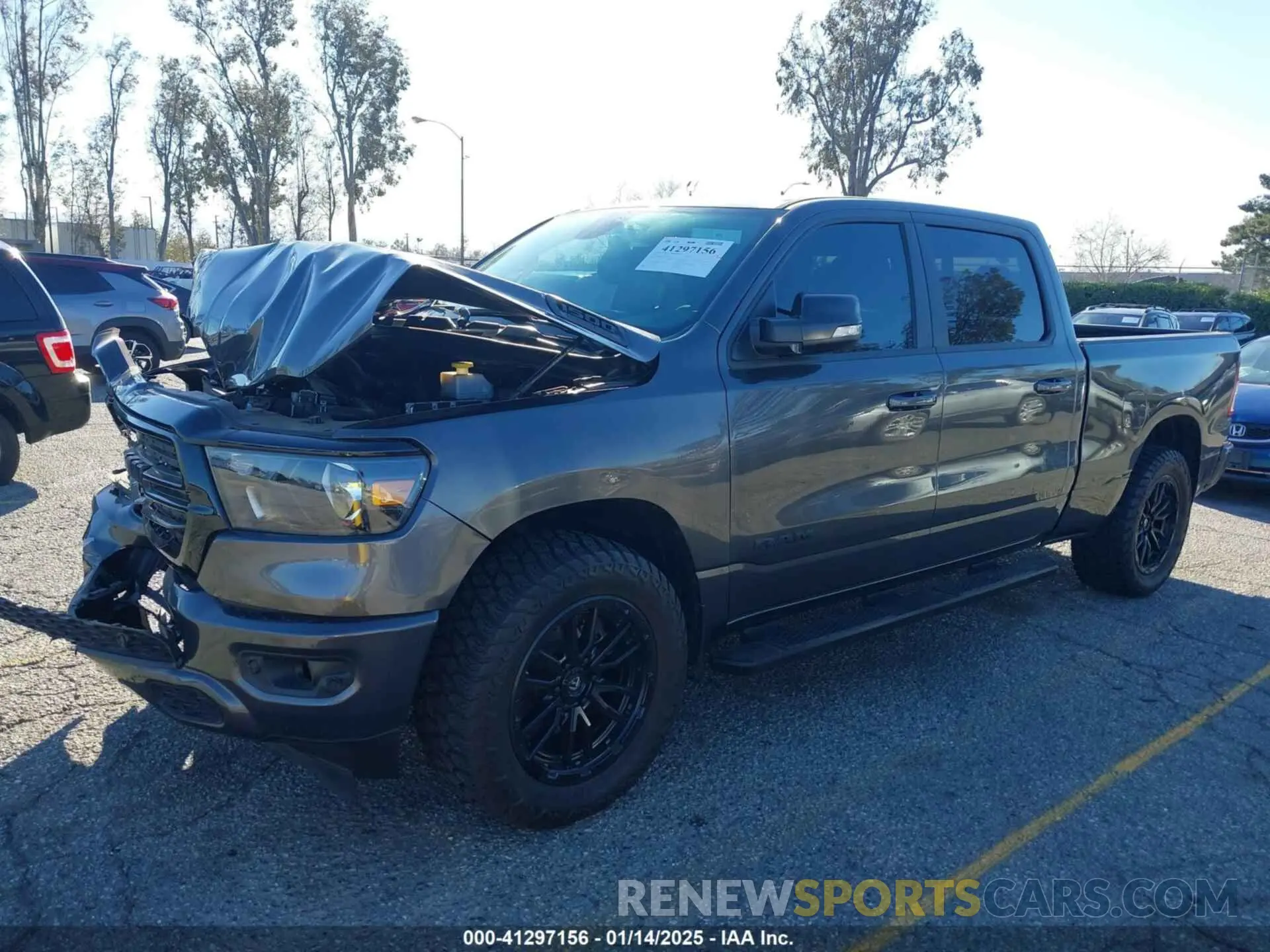 2 Photograph of a damaged car 1C6SRFMT6LN118624 RAM 1500 2020