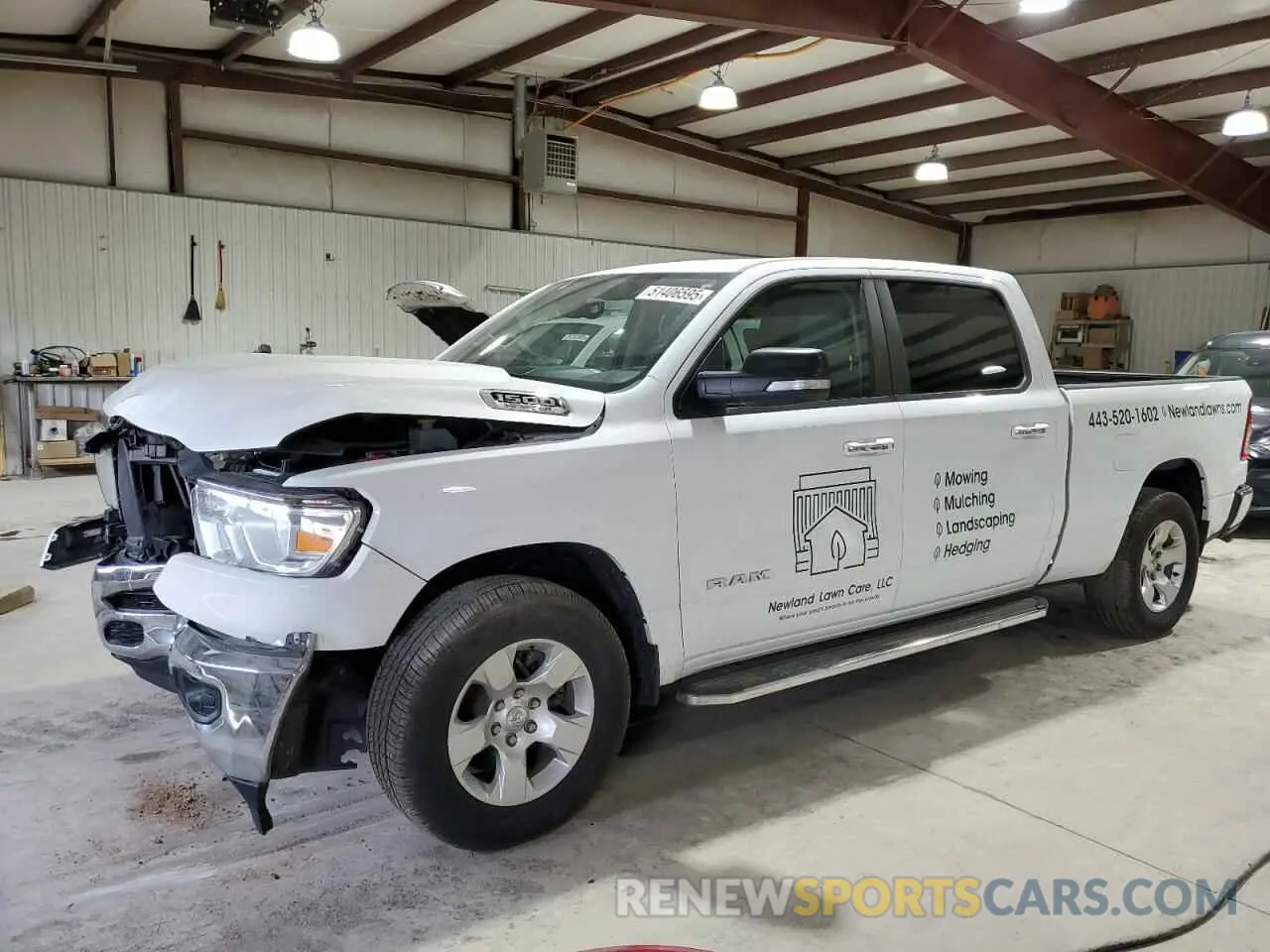 1 Photograph of a damaged car 1C6SRFMT6LN339656 RAM 1500 2020