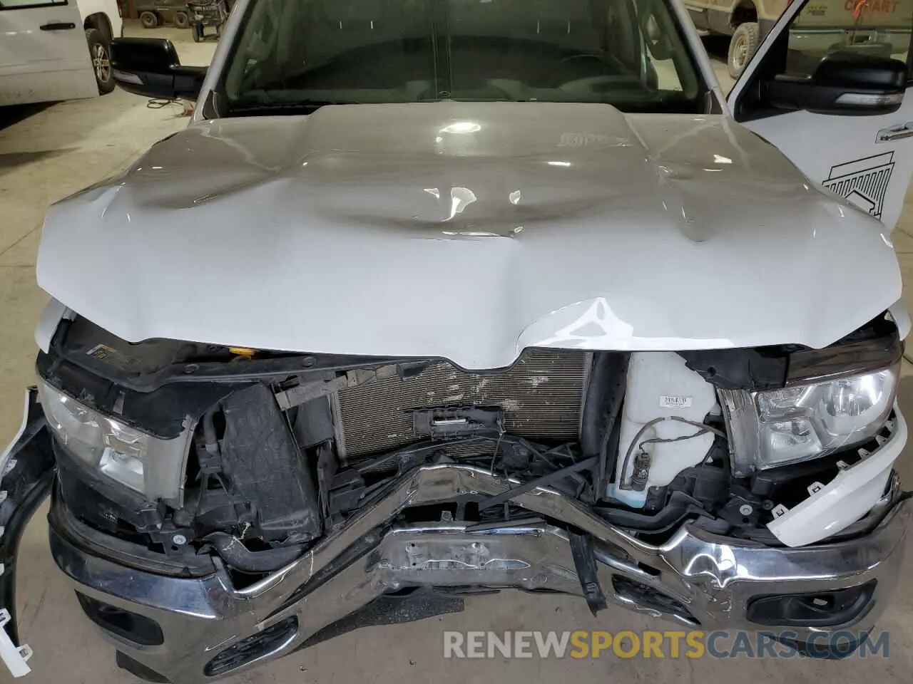 11 Photograph of a damaged car 1C6SRFMT6LN339656 RAM 1500 2020