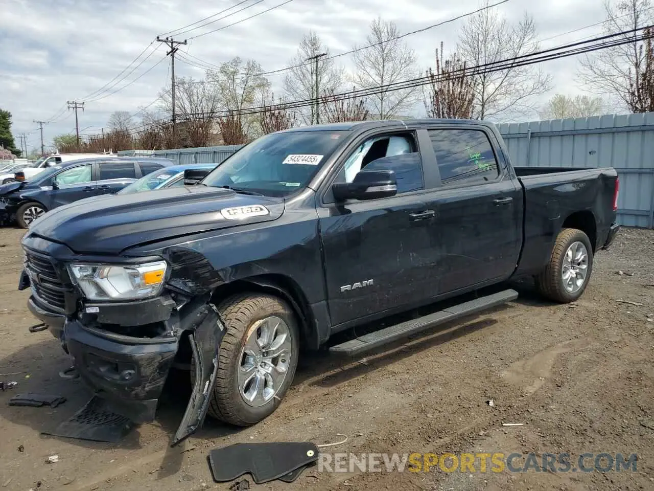 1 Photograph of a damaged car 1C6SRFMT8LN223701 RAM 1500 2020