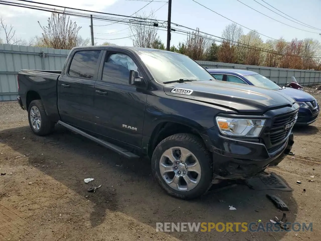 4 Photograph of a damaged car 1C6SRFMT8LN223701 RAM 1500 2020