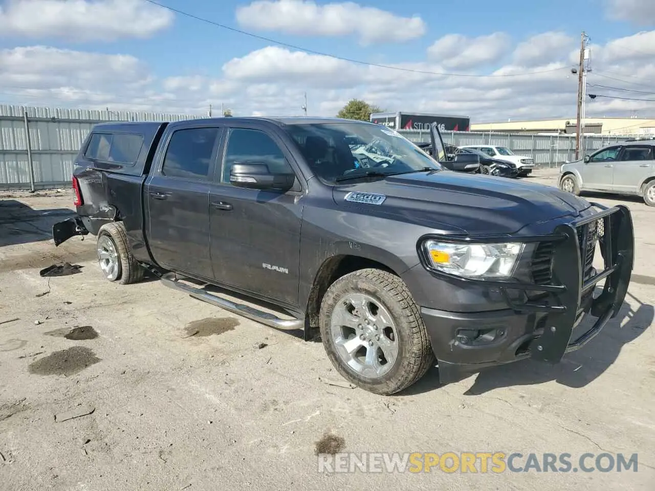 4 Photograph of a damaged car 1C6SRFMT8LN329307 RAM 1500 2020