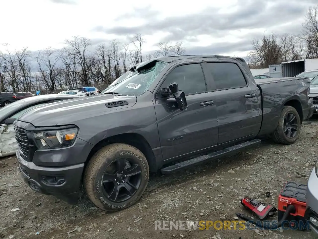1 Photograph of a damaged car 1C6SRFMT9LN243987 RAM 1500 2020