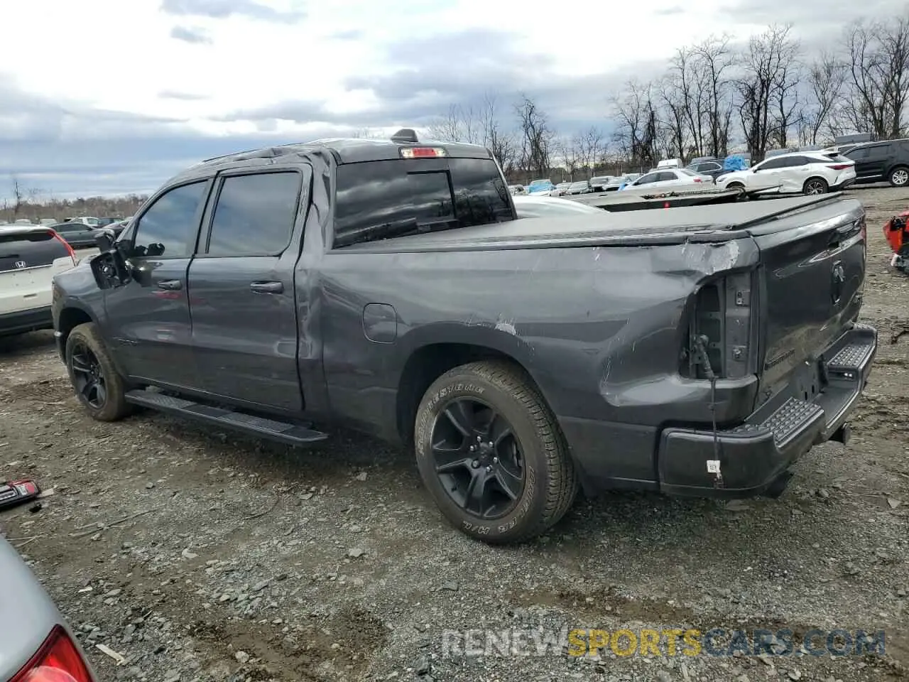 2 Photograph of a damaged car 1C6SRFMT9LN243987 RAM 1500 2020