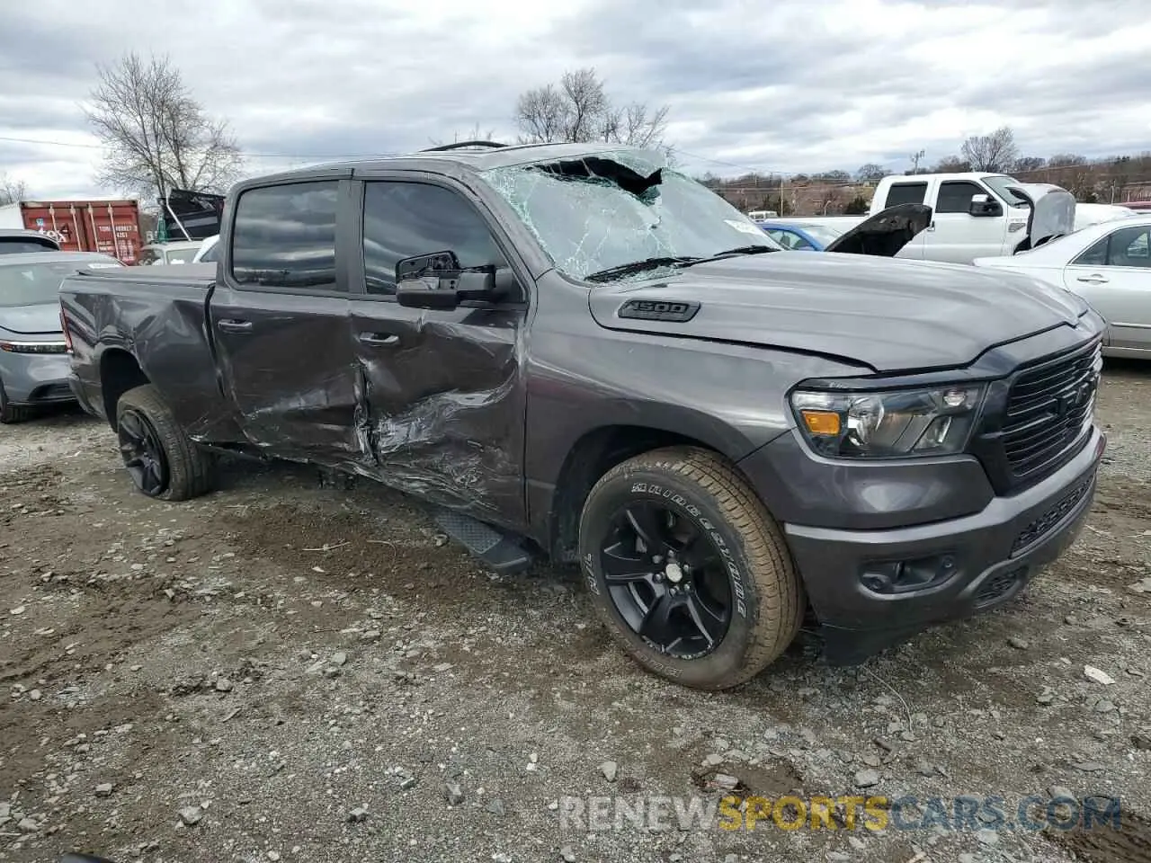 4 Photograph of a damaged car 1C6SRFMT9LN243987 RAM 1500 2020