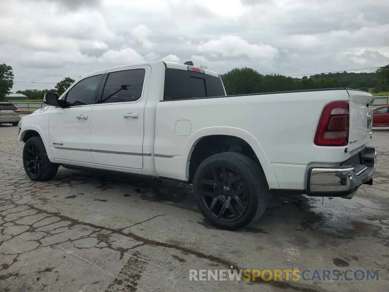 2 Photograph of a damaged car 1C6SRFPT4LN301841 RAM 1500 2020