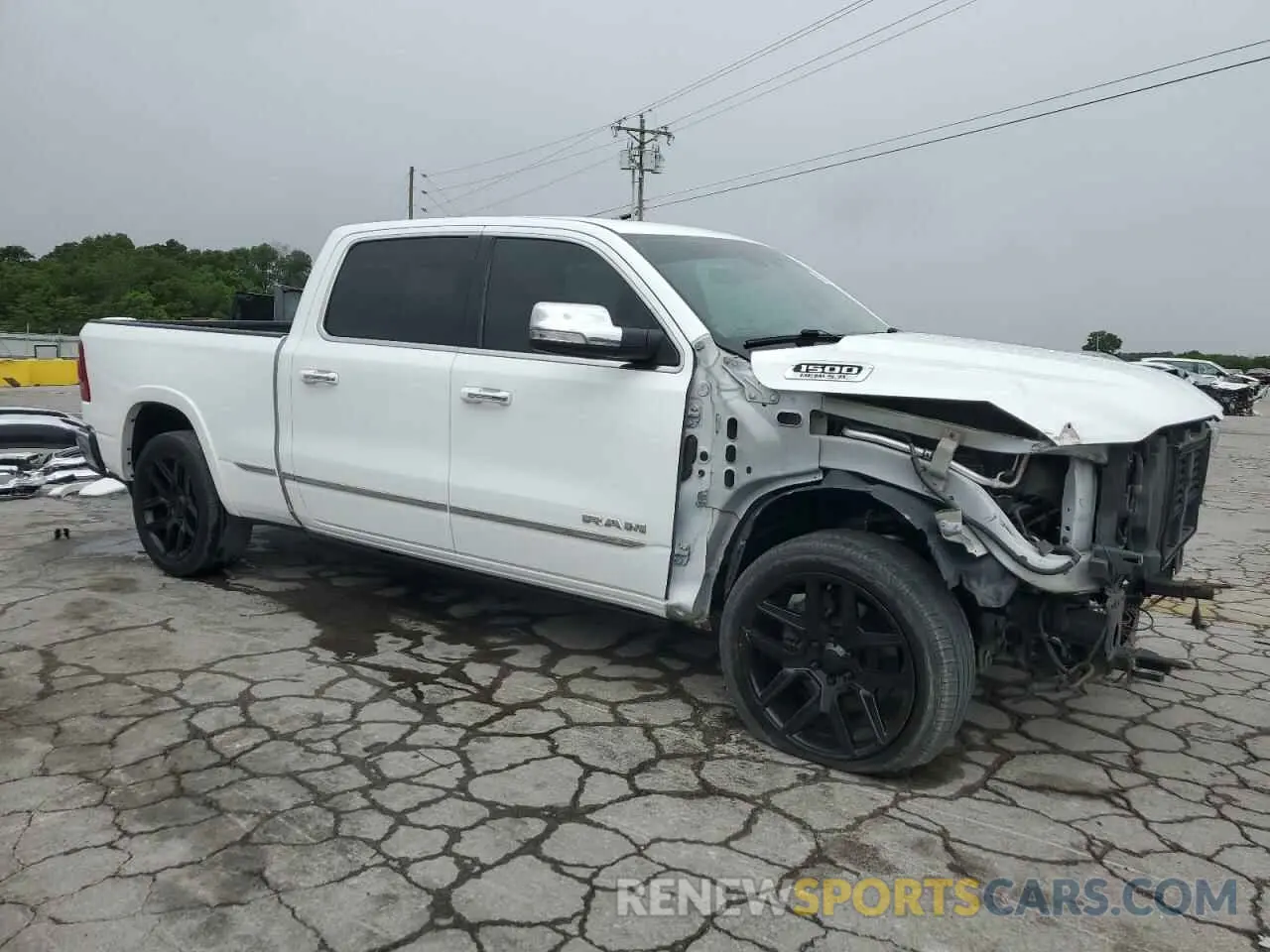 4 Photograph of a damaged car 1C6SRFPT4LN301841 RAM 1500 2020