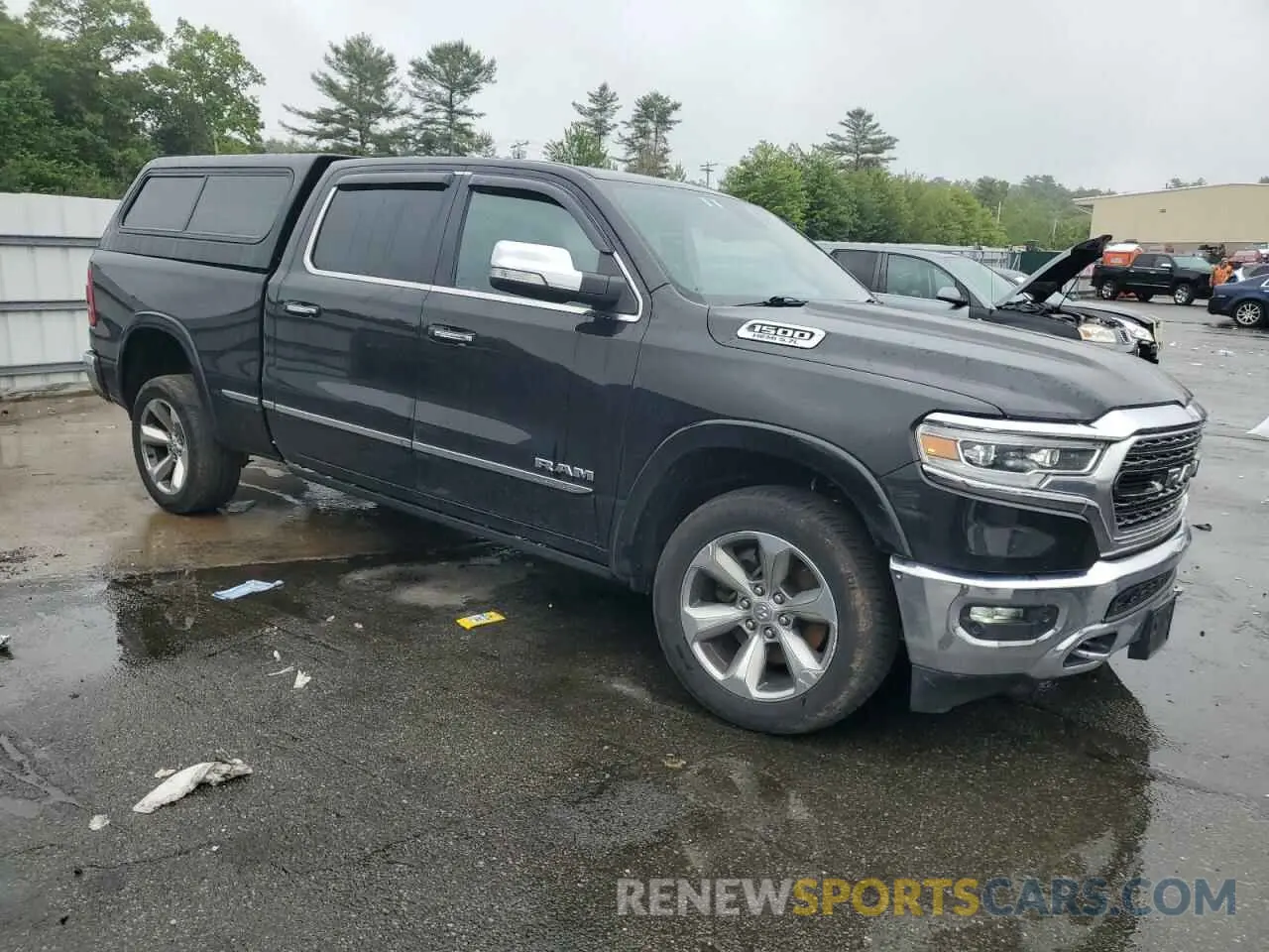 4 Photograph of a damaged car 1C6SRFPT8LN329237 RAM 1500 2020