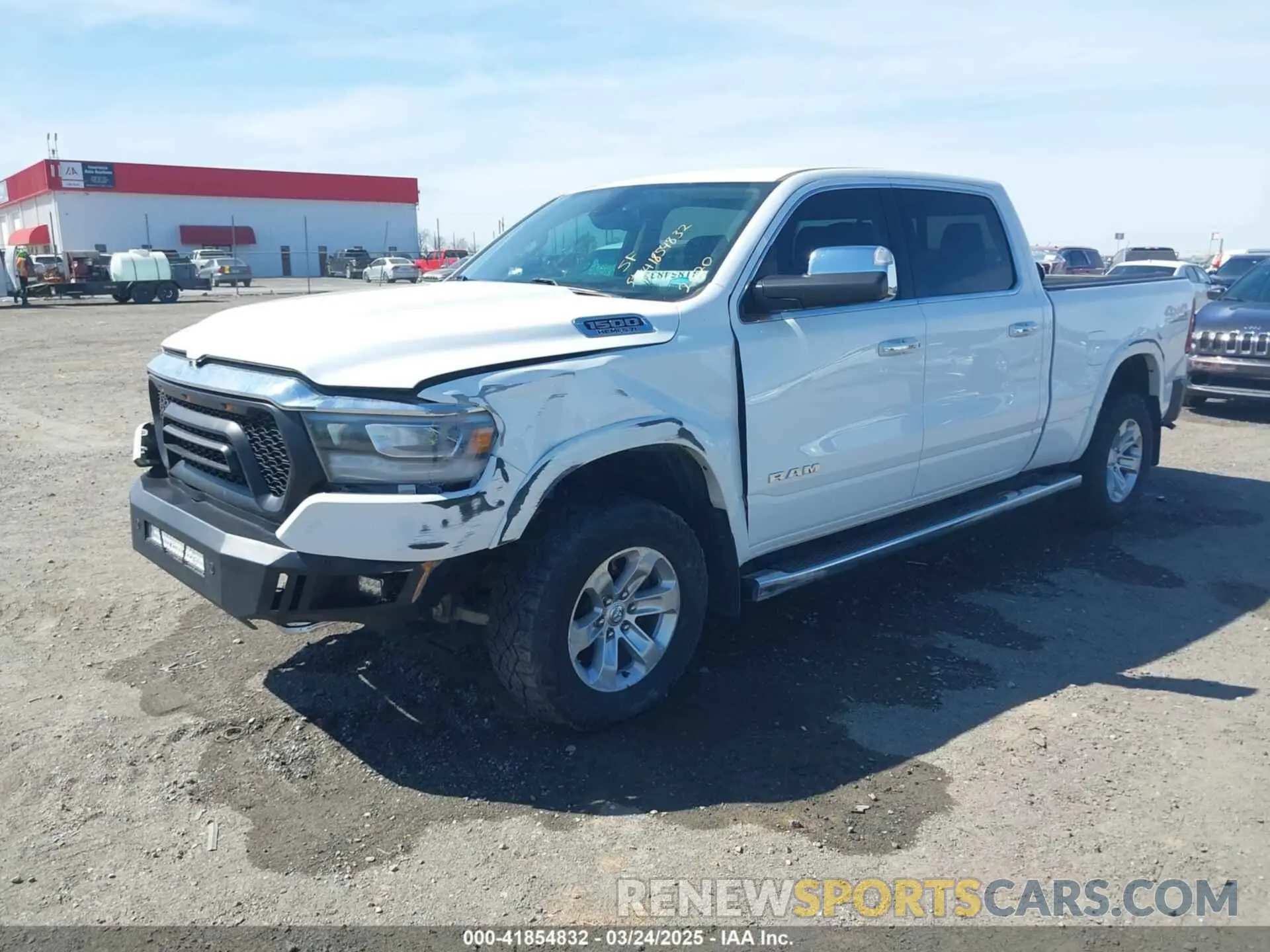 2 Photograph of a damaged car 1C6SRFRT5LN279572 RAM 1500 2020