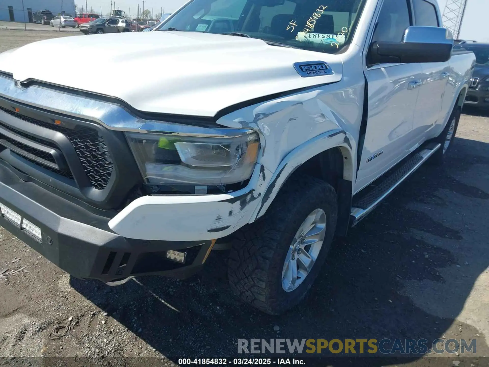6 Photograph of a damaged car 1C6SRFRT5LN279572 RAM 1500 2020