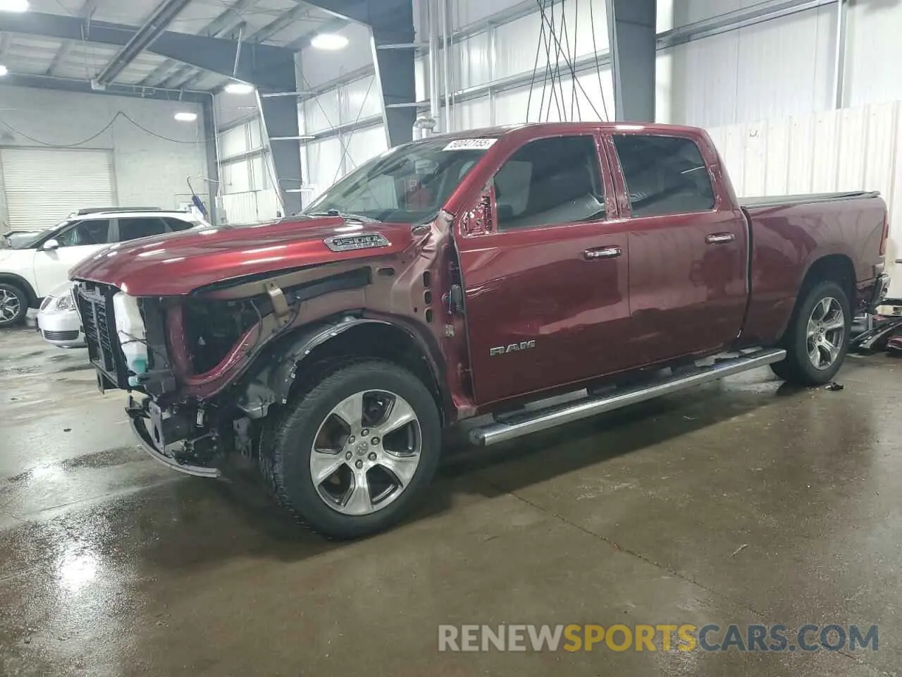 1 Photograph of a damaged car 1C6SRFRT9LN306711 RAM 1500 2020
