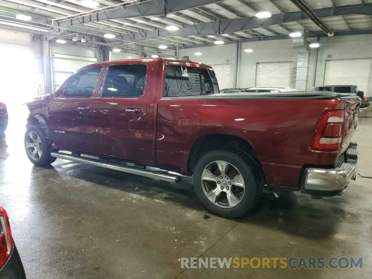 2 Photograph of a damaged car 1C6SRFRT9LN306711 RAM 1500 2020