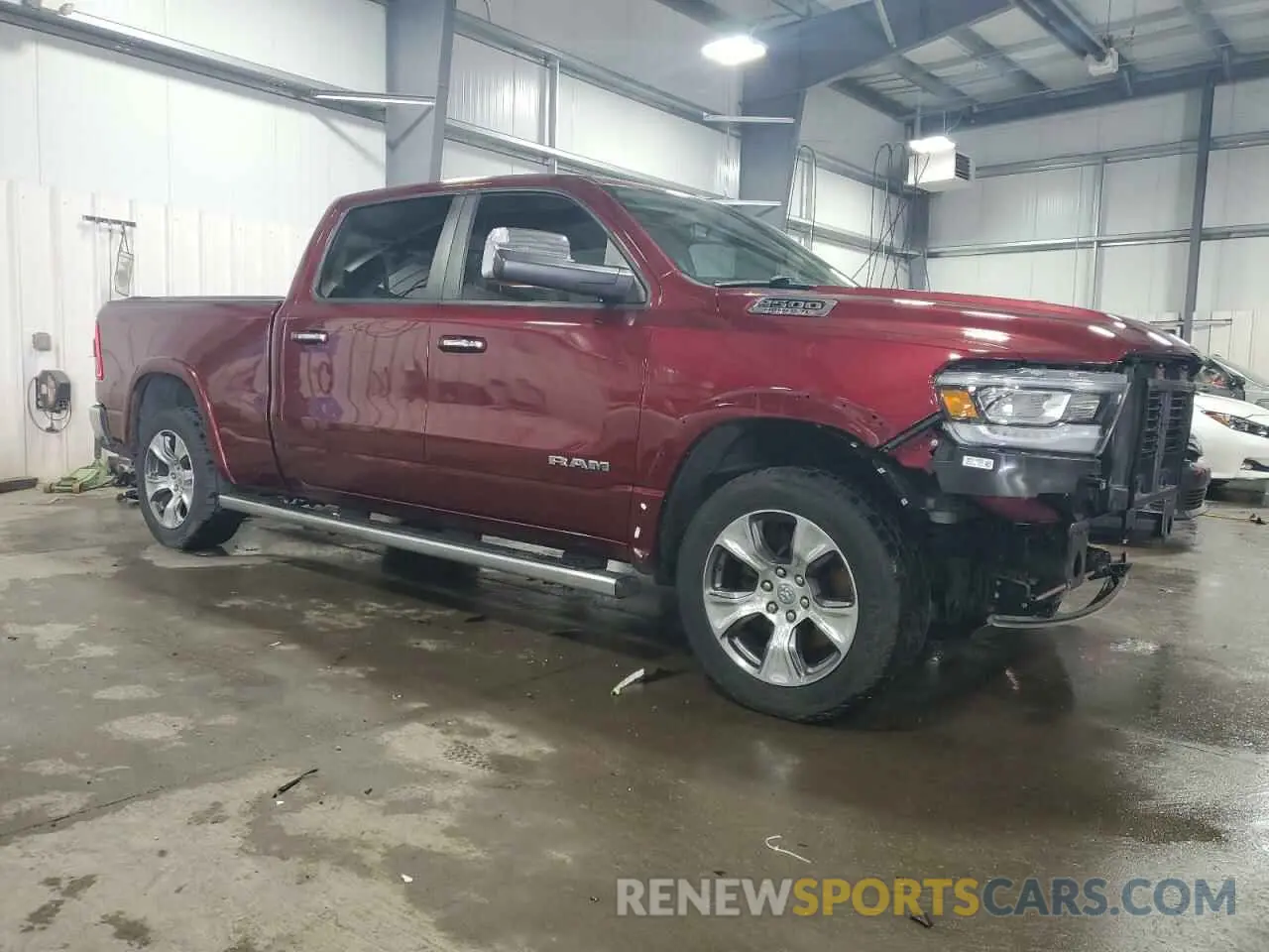 4 Photograph of a damaged car 1C6SRFRT9LN306711 RAM 1500 2020