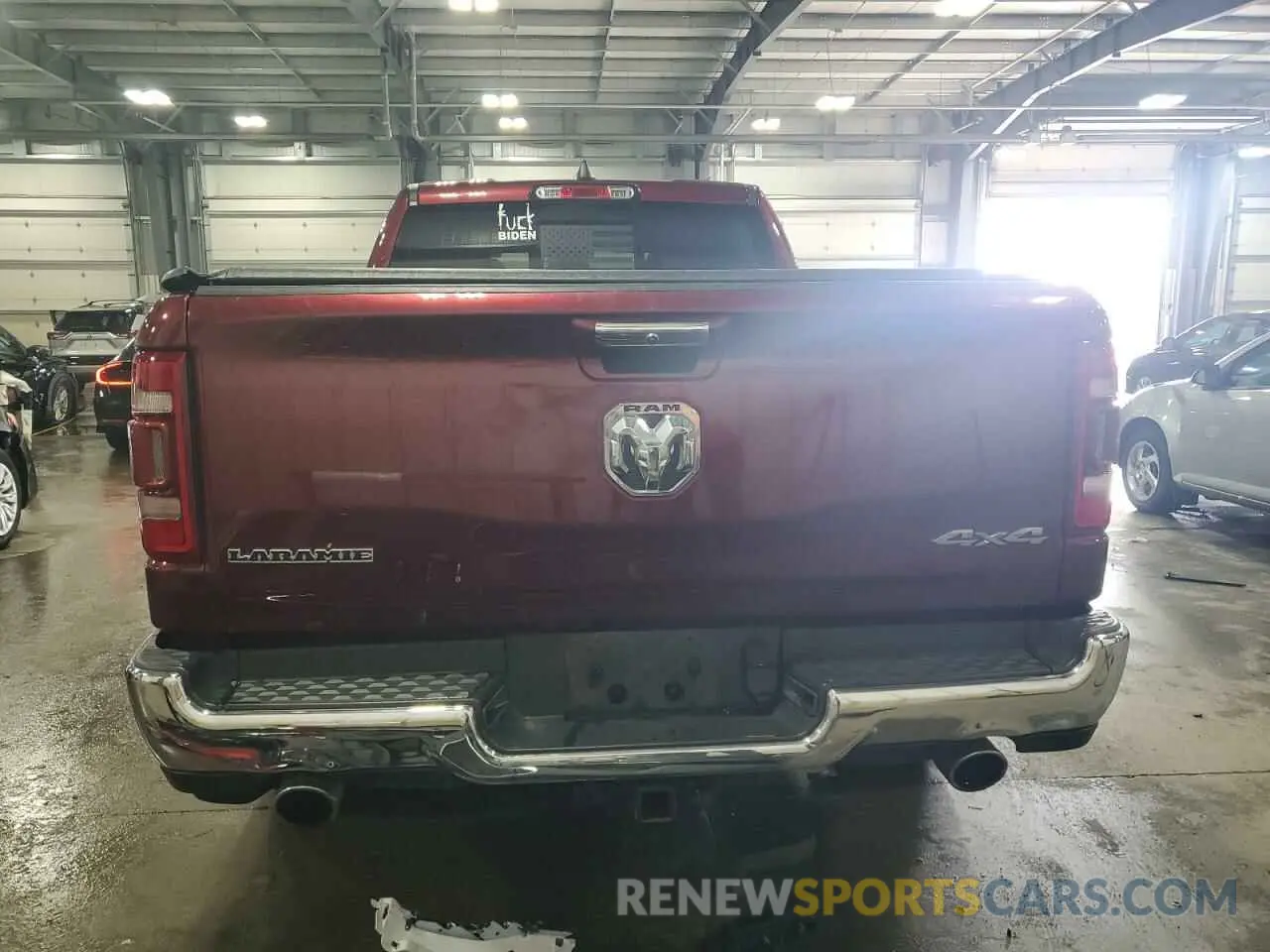 6 Photograph of a damaged car 1C6SRFRT9LN306711 RAM 1500 2020