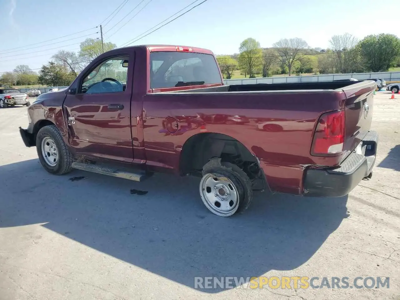 2 Photograph of a damaged car 3C6JR6AG0LG122499 RAM 1500 2020