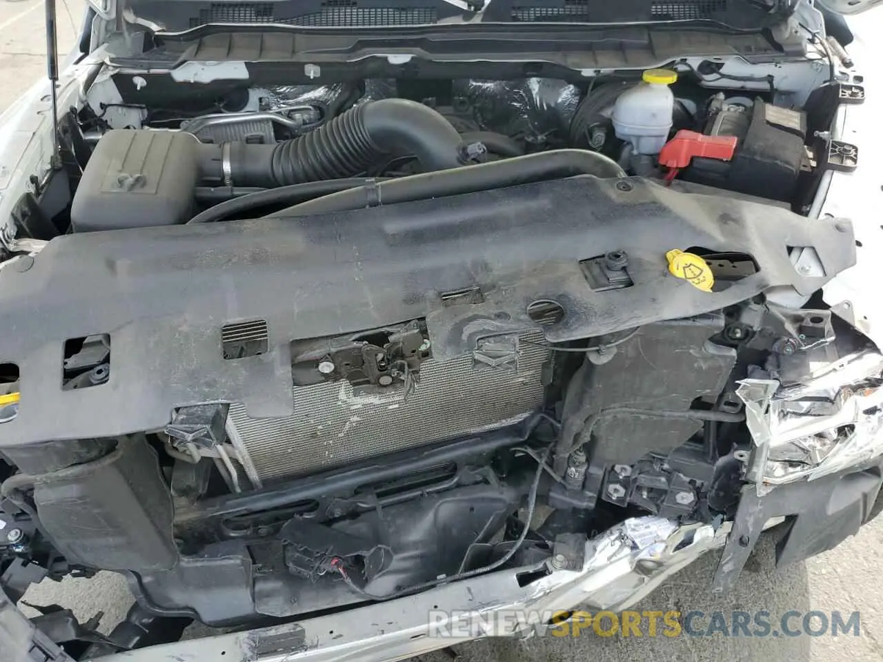 11 Photograph of a damaged car 3C6JR6AT2LG232080 RAM 1500 2020