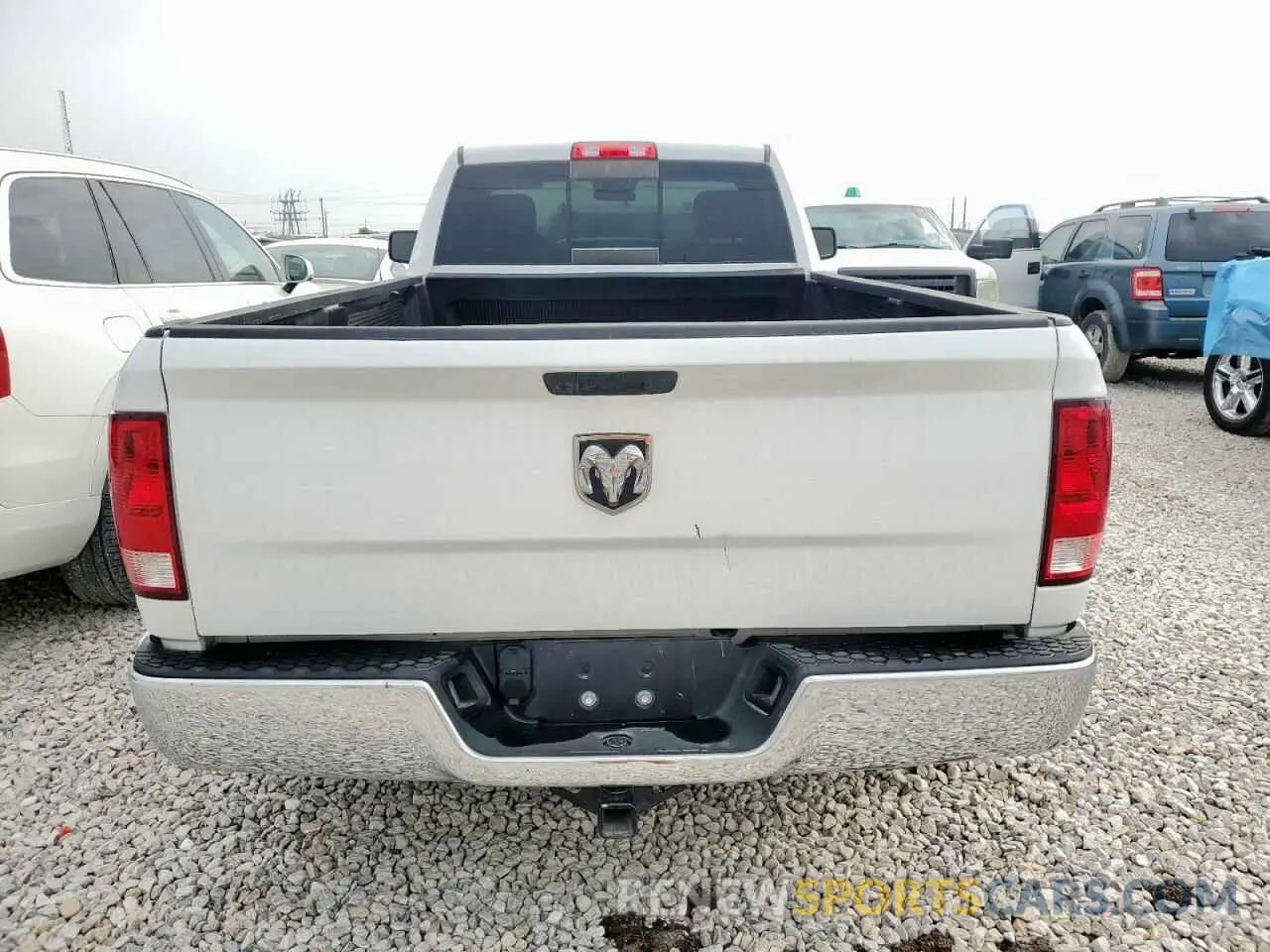 6 Photograph of a damaged car 3C6JR6DT9LG138774 RAM 1500 2020