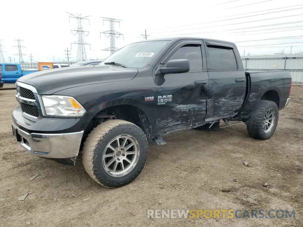 1 Photograph of a damaged car 3C6RR7KT0LG131059 RAM 1500 2020
