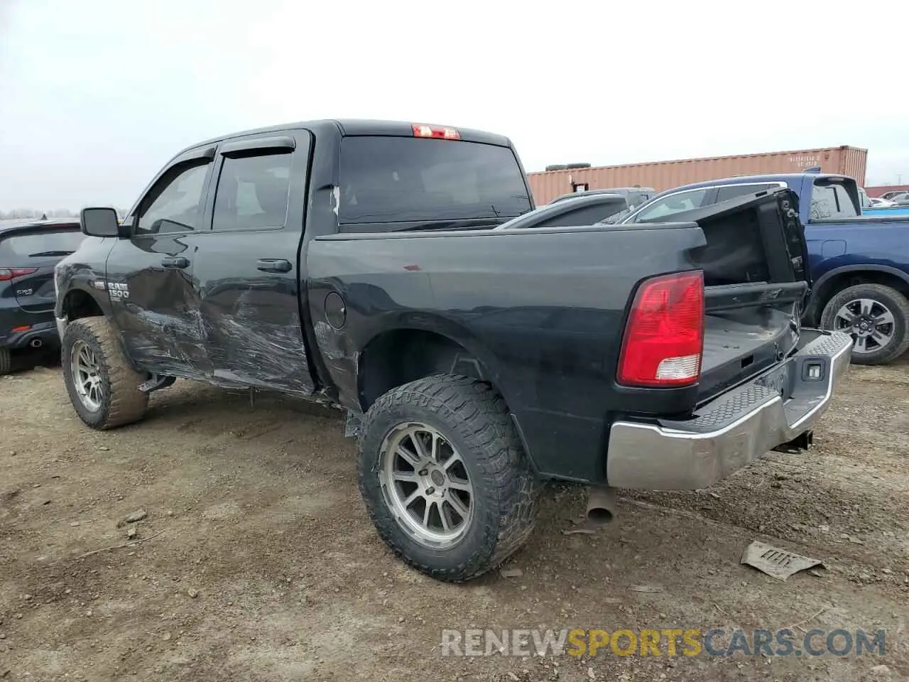 2 Photograph of a damaged car 3C6RR7KT0LG131059 RAM 1500 2020