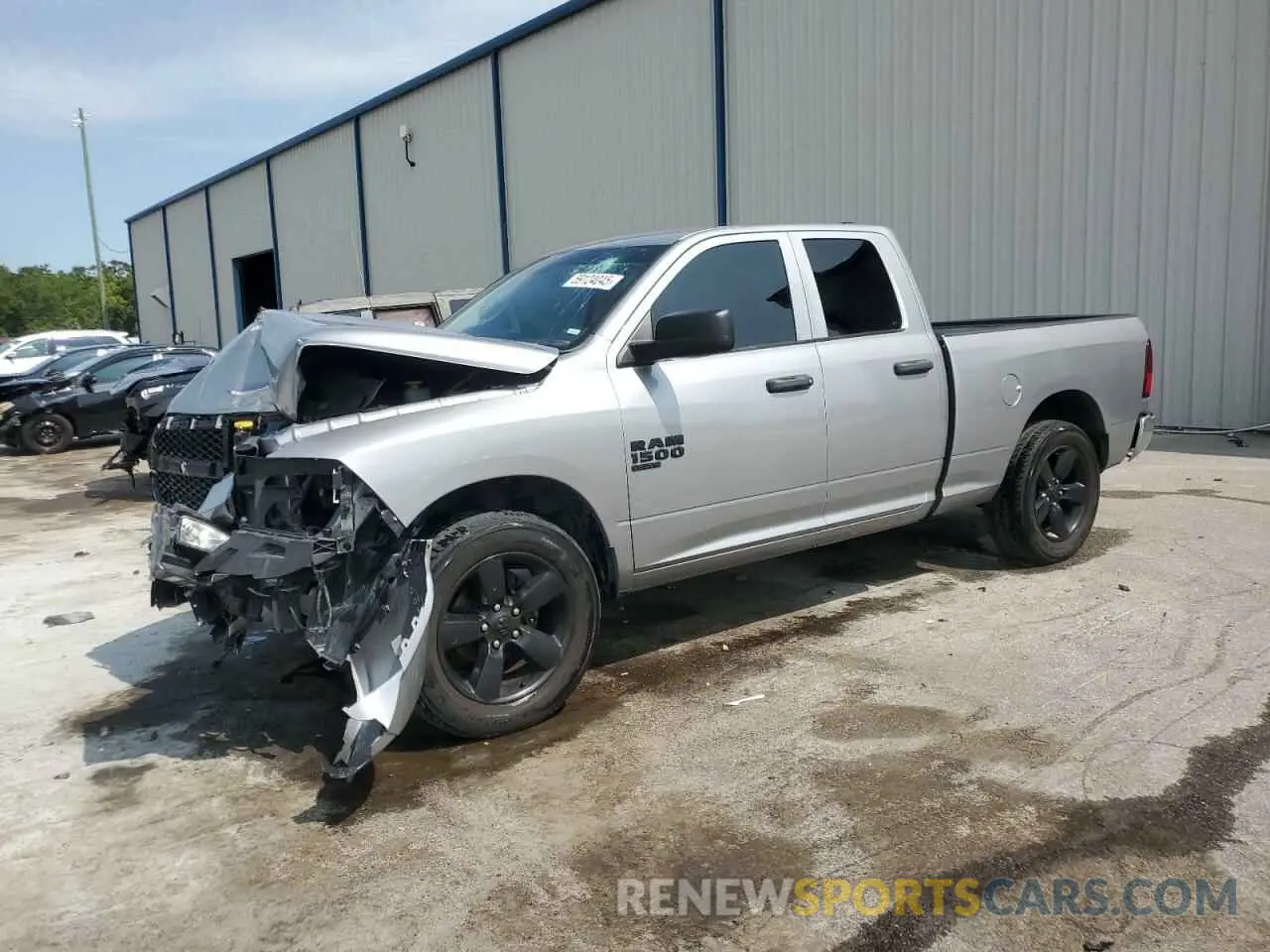 1 Photograph of a damaged car 1C6RR6FG0MS520978 RAM 1500 2021