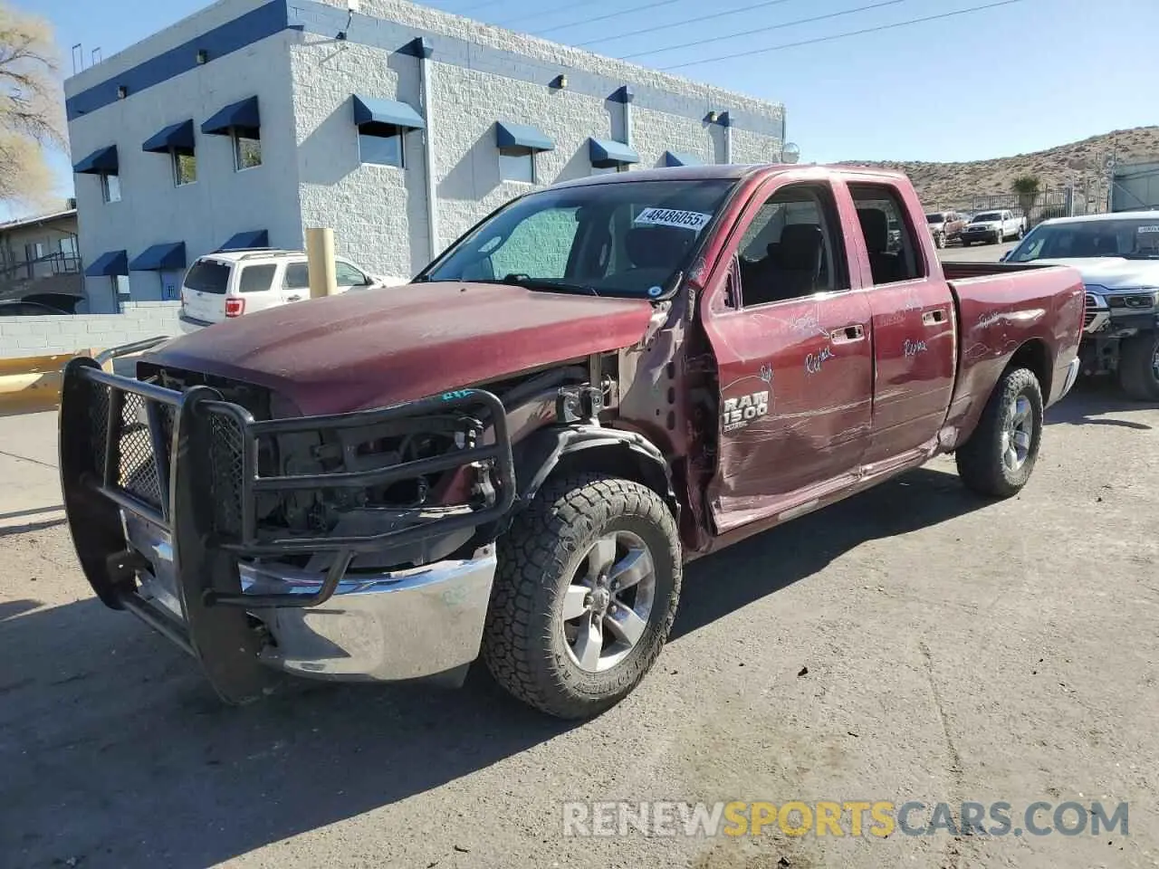 1 Photograph of a damaged car 1C6RR6FG6MS534383 RAM 1500 2021