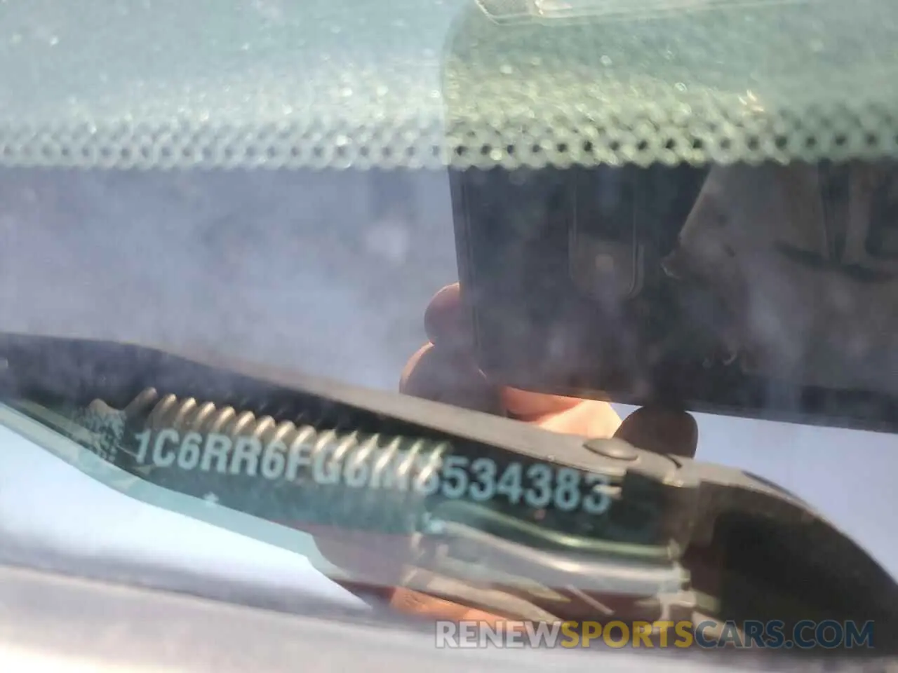 12 Photograph of a damaged car 1C6RR6FG6MS534383 RAM 1500 2021