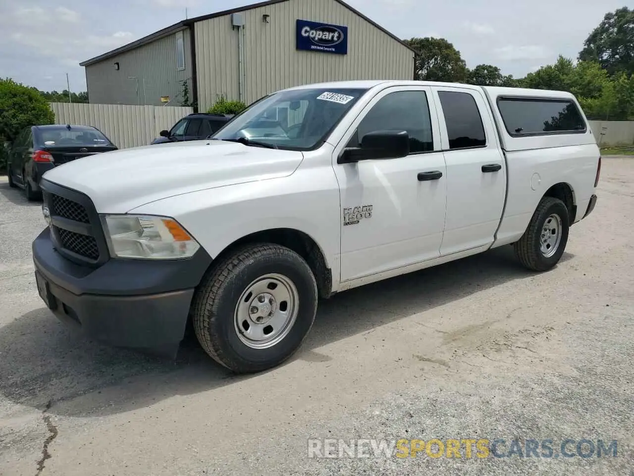 1 Photograph of a damaged car 1C6RR6FG9MS513009 RAM 1500 2021