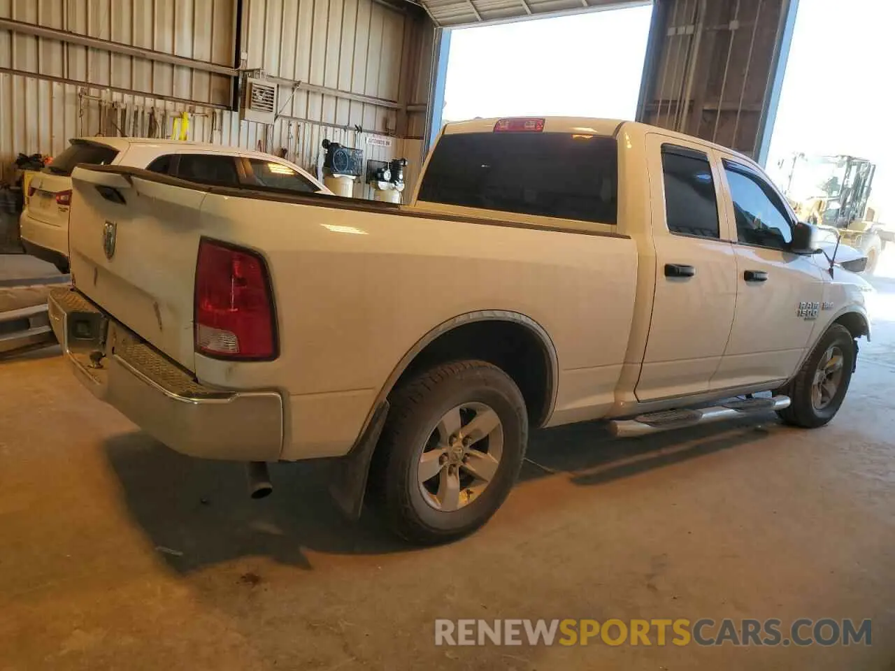 3 Photograph of a damaged car 1C6RR6FT2MS534474 RAM 1500 2021