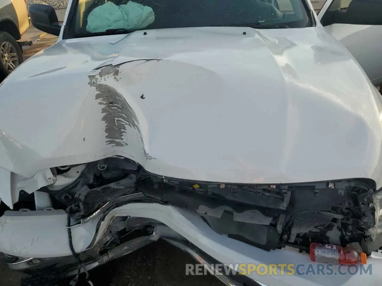 11 Photograph of a damaged car 1C6RR6FT3MS569041 RAM 1500 2021