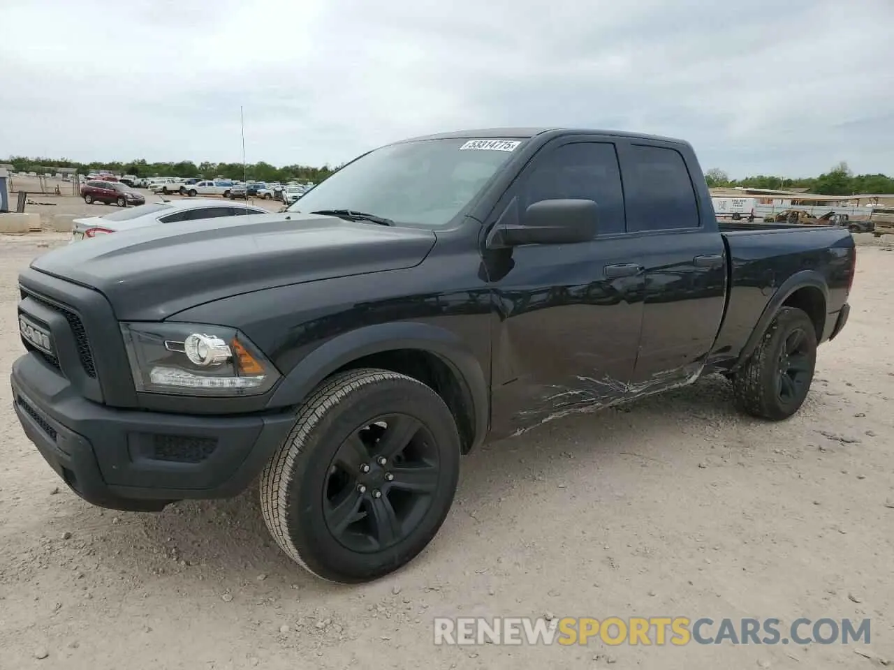 1 Photograph of a damaged car 1C6RR6GGXMS558927 RAM 1500 2021