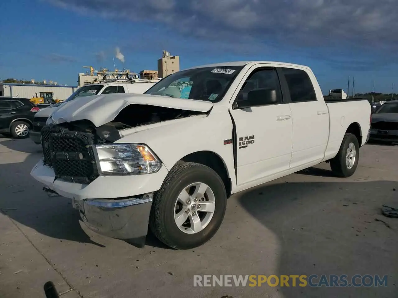 1 Photograph of a damaged car 1C6RR6TT5MS516202 RAM 1500 2021