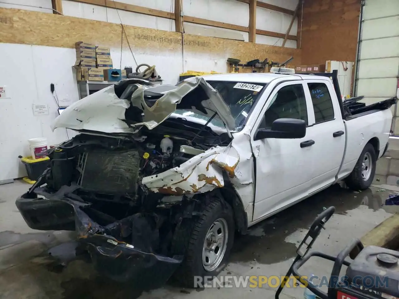 1 Photograph of a damaged car 1C6RR7FG1MS511213 RAM 1500 2021