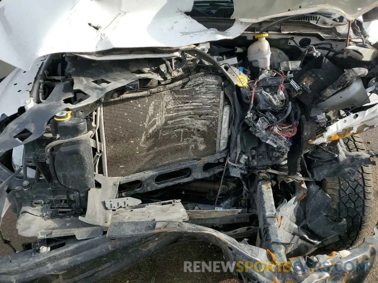 11 Photograph of a damaged car 1C6RR7FG1MS511213 RAM 1500 2021
