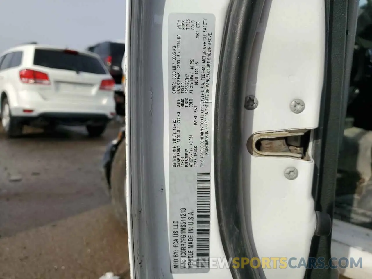 13 Photograph of a damaged car 1C6RR7FG1MS511213 RAM 1500 2021