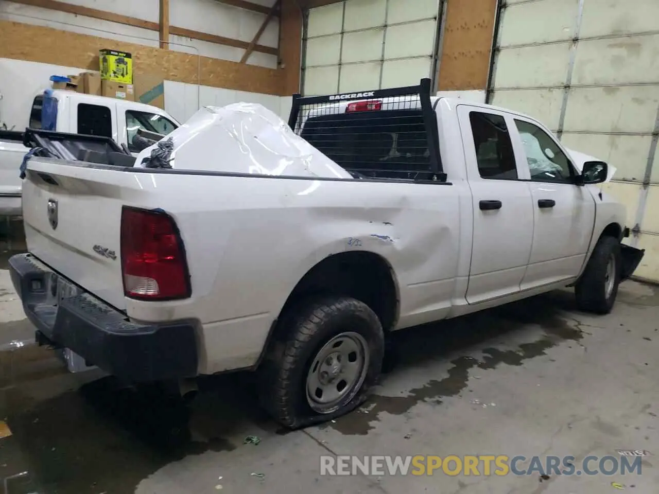 3 Photograph of a damaged car 1C6RR7FG1MS511213 RAM 1500 2021